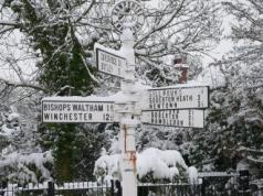Snow on a signpost