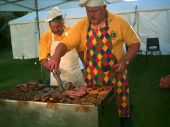 Pete burning bangers - yum! Cash for Rainbow Centre